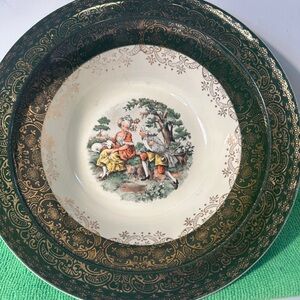 Courting bowl Taylor smith green with gold trim .